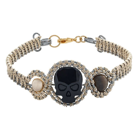 PULSERA KRANIO TEJIDA ALAMBRE C/DIJE GLOW GDE UNISEX