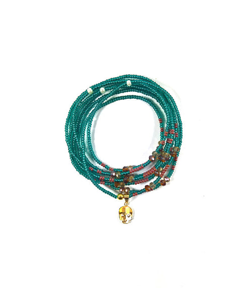 DIJE KRANIO GLOW DORADO 10K Y CHAQUIRA KRÁNIO COMBINATIONS CHOKER & PULSERA VERDE