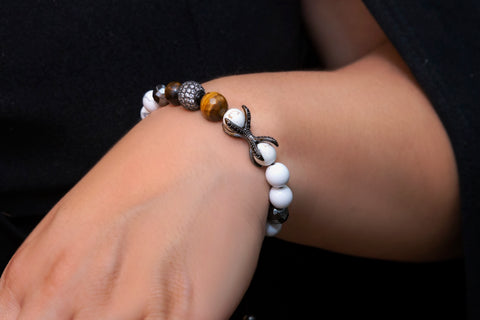 PULSERA BLANCA GARRAS