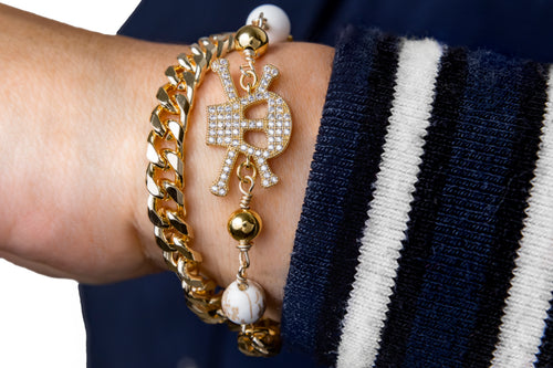 PULSERA DOBLE CALAVERA CON PIEDRAS BLANCAS